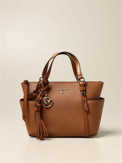 michael kors pelle|Michael Kors borse firmate.